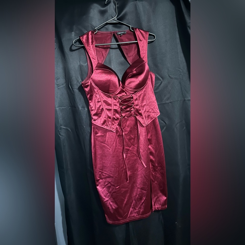 Maroon/red dress with corset.